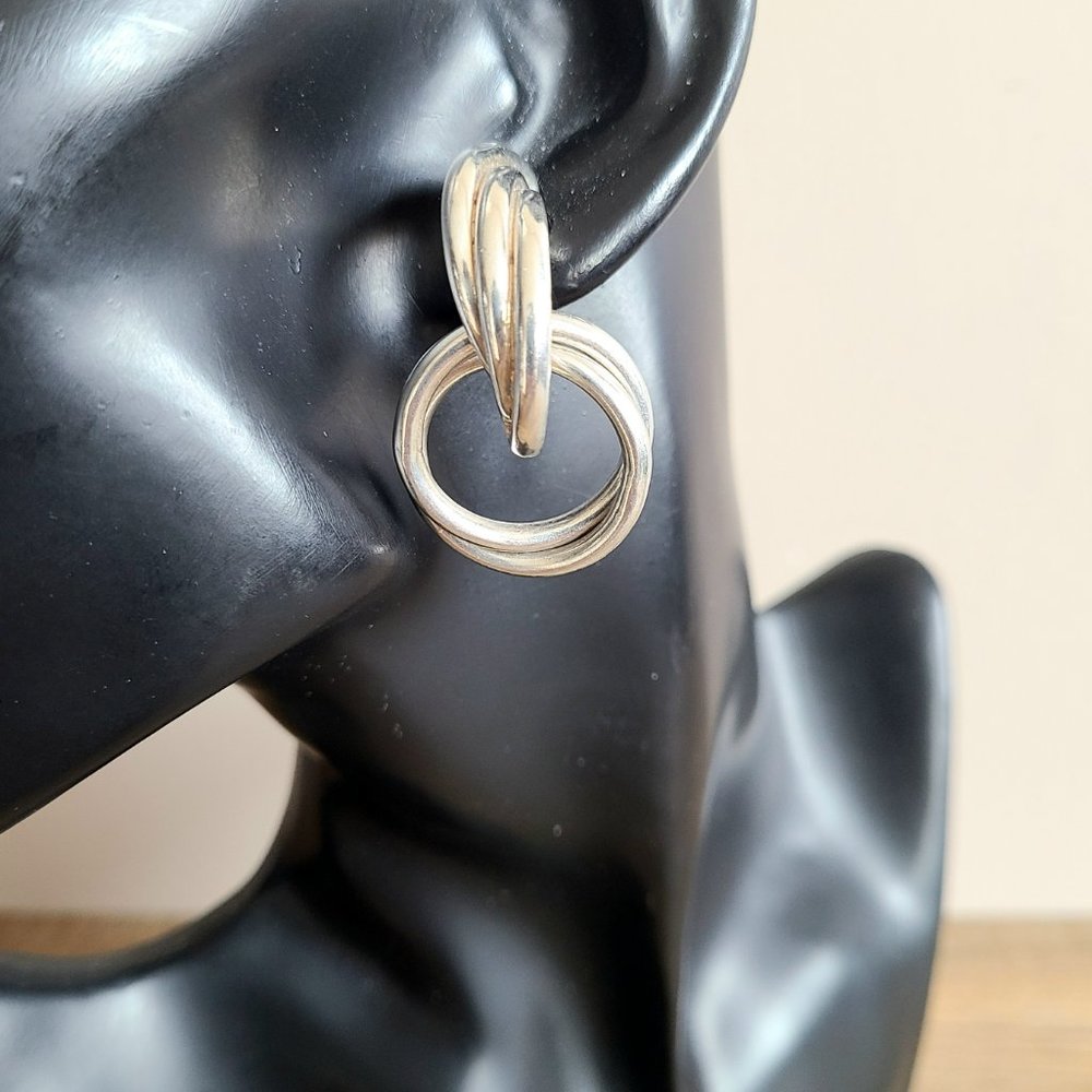 Sterling silver oversized drop and dangling modernist statement earrings.